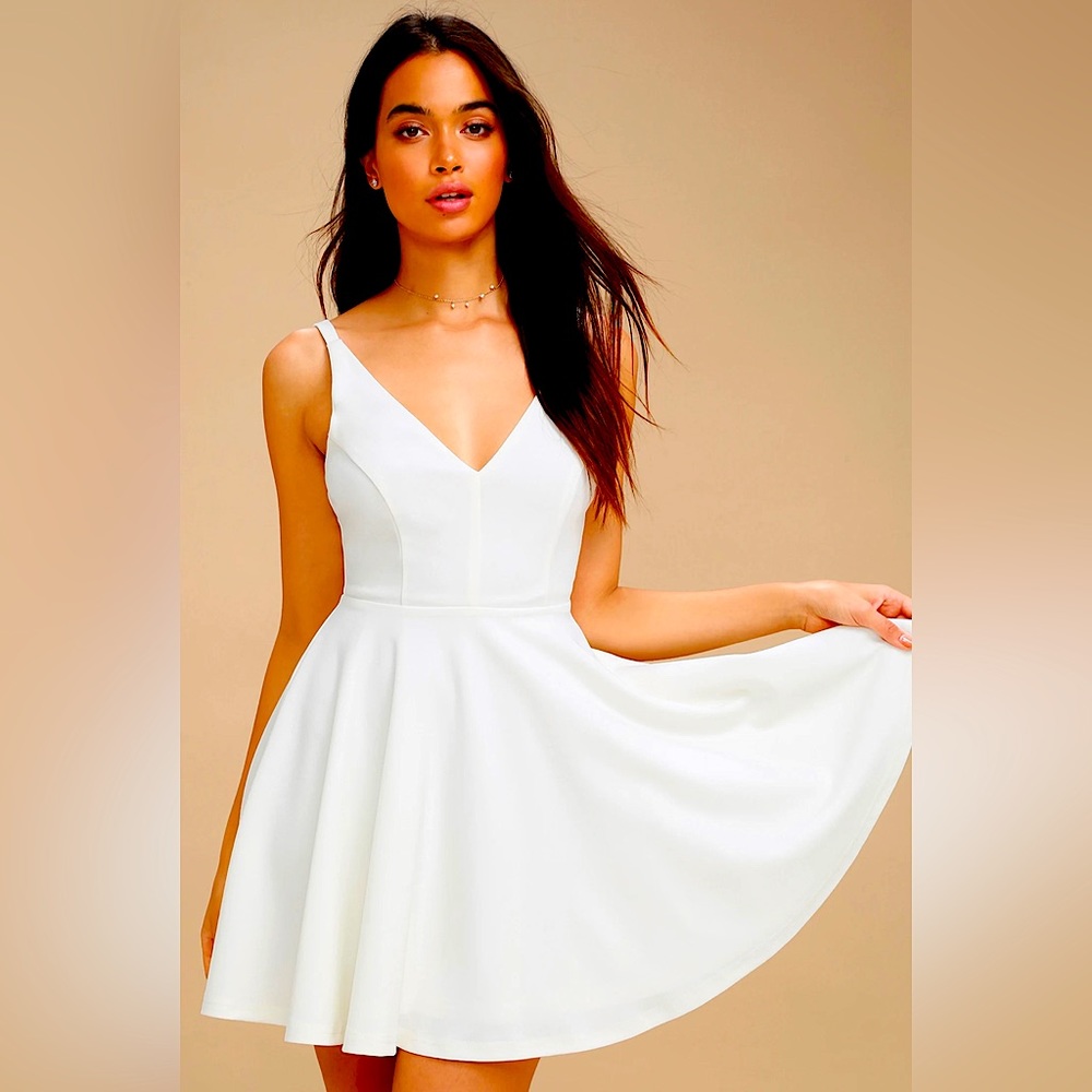 Lulu’s brand, beautiful, ivory fit and flare dress.
